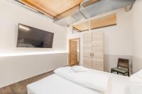 Postel nebo postele na pokoji v ubytování Chalets am Badesee Lassing