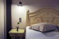Postel nebo postele na pokoji v ubytování Hotel Doltso