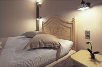 Postel nebo postele na pokoji v ubytování Hotel Doltso