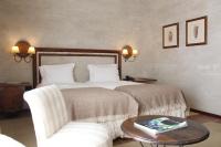 Uma cama ou camas num quarto em Pousada Convento de Belmonte