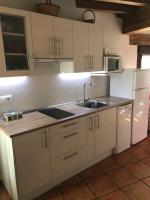 Kuchyň nebo kuchyňský kout v ubytování Casa Rural - Al Alba