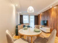 Televízia a/alebo spoločenská miestnosť v ubytovaní Apartament Premium Bliżej Morza
