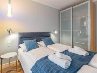 Posteľ alebo postele v izbe v ubytovaní Apartament Premium Bliżej Morza
