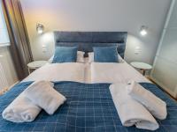 Posteľ alebo postele v izbe v ubytovaní Apartament Premium Bliżej Morza