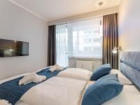 Posteľ alebo postele v izbe v ubytovaní Apartament Premium Bliżej Morza