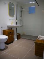 a bathroom with a sink and a toilet and a shower at Le champ de l&#39;eau in Crécy-la-Chapelle