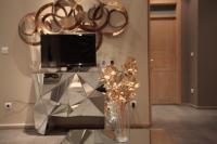 TV a/nebo společenská místnost v ubytování madrid central gran via Suites
