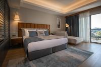 Postel nebo postele na pokoji v ubytování Seaden Quality Resort & Spa Ultra All Inclusive