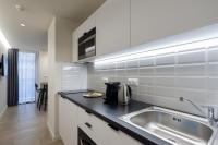 A kitchen or kitchenette at Hestia - Alexandras 38