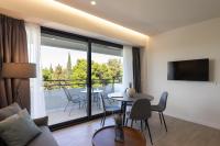 A television and/or entertainment centre at Hestia - Alexandras 38