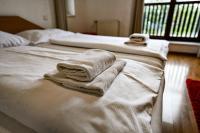 Postel nebo postele na pokoji v ubytování Aparthotel Faust