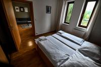 Postel nebo postele na pokoji v ubytování Aparthotel Faust