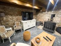 TV a/nebo společenská místnost v ubytování Kuća za odmor Paun