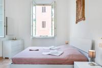 Posteľ alebo postele v izbe v ubytovaní Borgo Stretto Bright Apartments