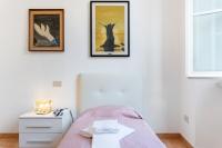 Posteľ alebo postele v izbe v ubytovaní Borgo Stretto Bright Apartments