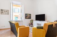 Televízia a/alebo spoločenská miestnosť v ubytovaní Borgo Stretto Bright Apartments