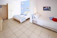 Postel nebo postele na pokoji v ubytování Miramare Hotel