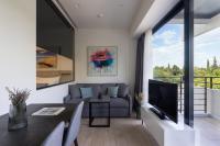 A television and/or entertainment centre at Hestia - Alexandras 38