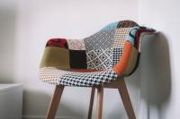 a chair with a blanket on top of it at La Perlina - Appartement + Parking - V-rent in Annecy