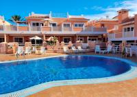 Bazén v ubytování Apartamento funcional en residencial con piscina en inmejorable ubicación en centro de la isla nebo v jeho okolí