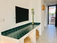 A television and/or entertainment centre at CocoBeach Mojácar