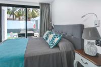 Postel nebo postele na pokoji v ubytování Two Dreams Luxury Villa