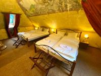 Posteľ alebo postele v izbe v ubytovaní Excalibur miniHotel