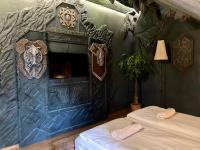 Posteľ alebo postele v izbe v ubytovaní Excalibur miniHotel