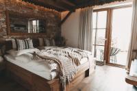 Łóżko lub łóżka w pokoju w obiekcie Jufenalm BOHO Hotel & Restaurant