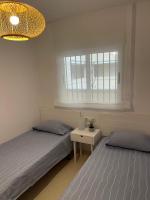 Postel nebo postele na pokoji v ubytování Apartamento MagicWorld