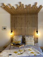 Studio Beach House &agrave; Sangatte bord de plage tesisinde bir odada yatak veya yataklar