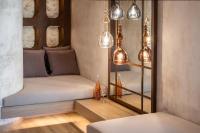 Postel nebo postele na pokoji v ubytování Inotropes Boutique Suites - Adults Only