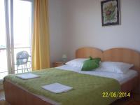 Posteľ alebo postele v izbe v ubytovaní Guesthouse Podaca