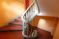 a staircase with a white railing in a room at Le Phare Bleu - near center &amp; beach - 2 to 4 P in Honfleur