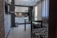 Kuchyň nebo kuchyňský kout v ubytování Apartment Central-LUX 1