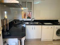 Kuchyňa alebo kuchynka v ubytovaní Chiclana casa maría