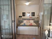 Posteľ alebo postele v izbe v ubytovaní Cozy Suite Siviri