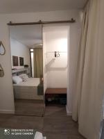 Posteľ alebo postele v izbe v ubytovaní Cozy Suite Siviri