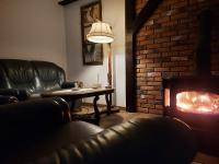 Posezení v ubytování OAZA SPOKOJU NA FERMIE JELENI SLOW LIFE APARTAMENTy
