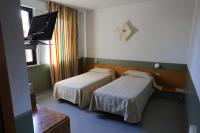 Posteľ alebo postele v izbe v ubytovaní Hotel Roma