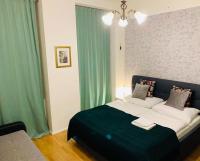Postel nebo postele na pokoji v ubytování Charles Square Prague Apartment
