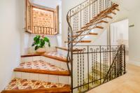 Łóżko lub łóżka w pokoju w obiekcie Petit Biniaraix - Ex Menditzu Rooms