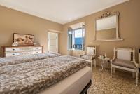 A bed or beds in a room at Casa Vacanze Voiandes