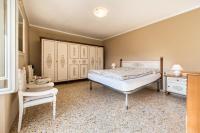A bed or beds in a room at Casa Vacanze Voiandes
