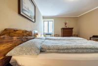 A bed or beds in a room at Casa Vacanze Voiandes