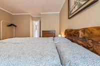 A bed or beds in a room at Casa Vacanze Voiandes