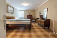 A bed or beds in a room at Casa Vacanze Voiandes