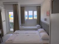 Hotel Turunç-Malmenにあるベッド