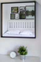 Łóżko lub łóżka w pokoju w obiekcie Apartamenty Zielona Lipka