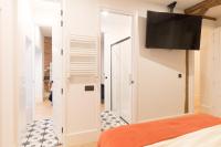 TV a/nebo společenská místnost v ubytování New Abando AC by Staynnapartments